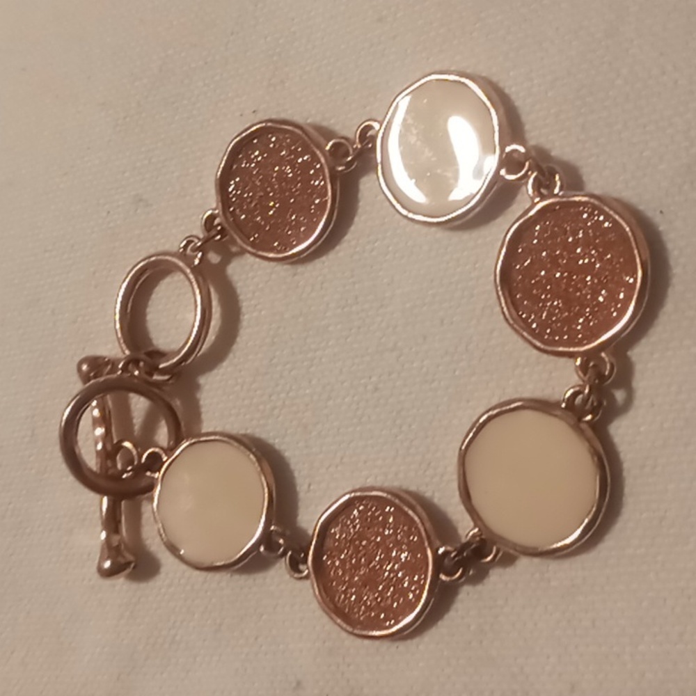 Rose gold color toggle clasp bracelet with enamel accents
